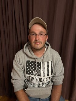 A picture of Luke a Committee Member.